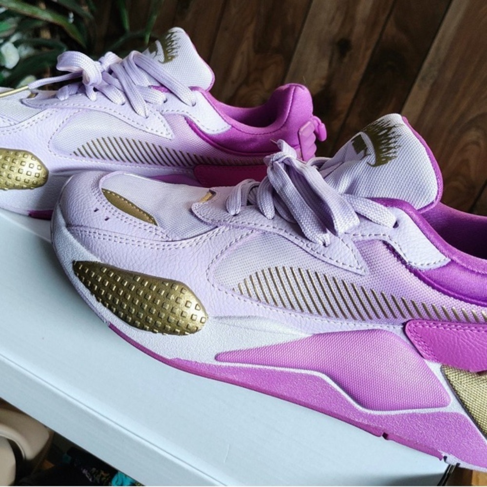 PUMA Pink and Gold Luxe Sneakers with Modern Silhouette